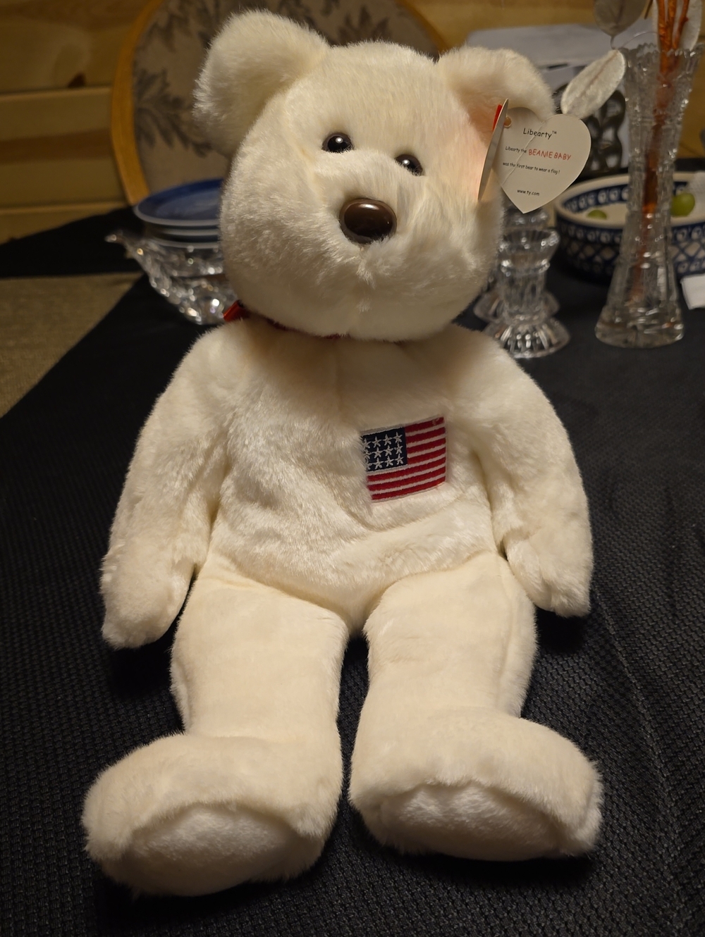 liberty Cream Plush Teddy Bear with American Flag Patch and Red Ribbon